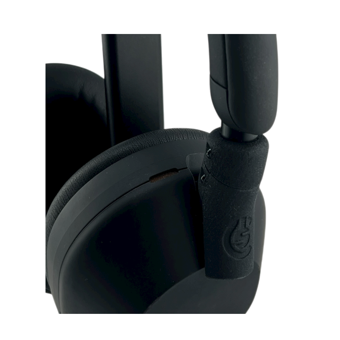 Black gaming headset with cushioned ear cups and an adjustable microphone arm.