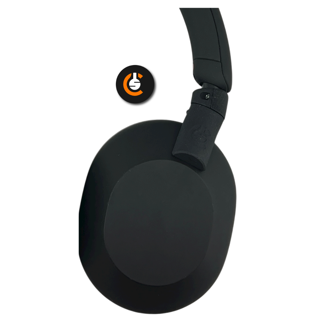 Black wireless headphone with a smooth matte finish and flexible headband.