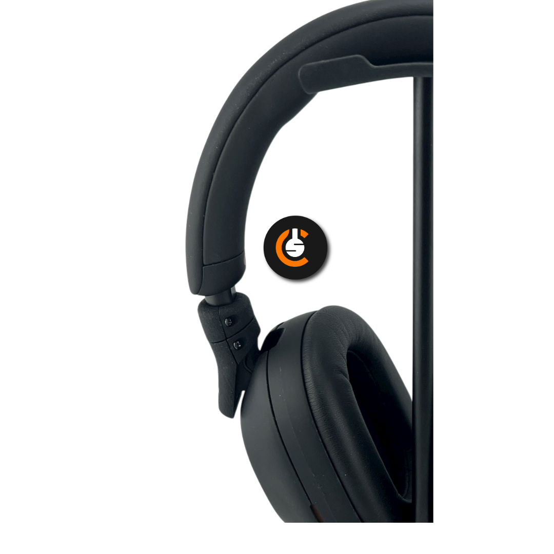 Black over-ear headphones with a power symbol logo on a white background.